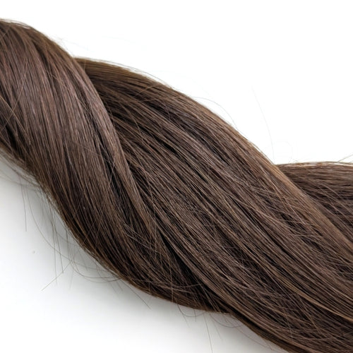 Hailie Hair Genoa shade dark brown genius weft hair extension swatch close up
