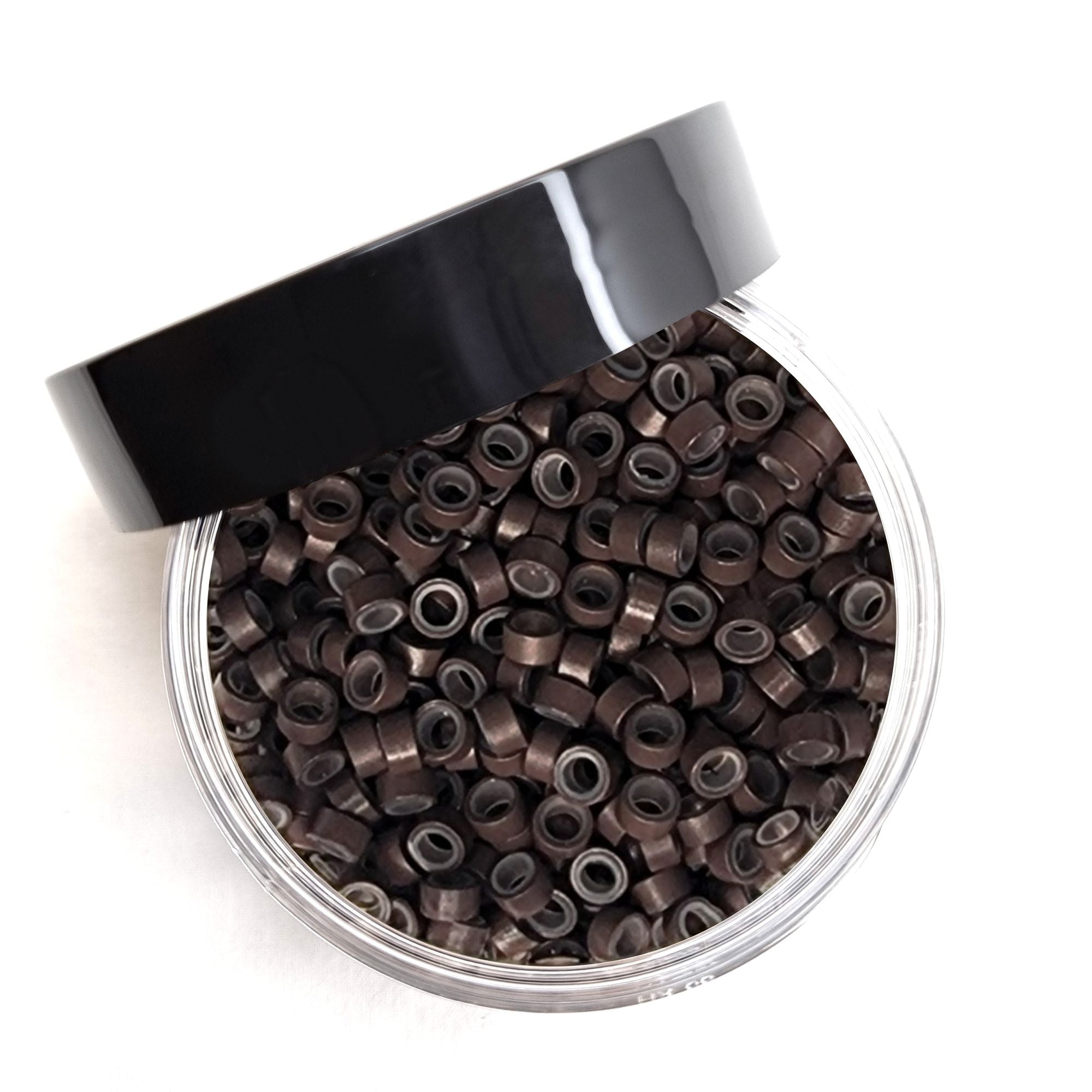 Salon professional silicon lined aluminium Dark Brown micro beads used as an anchor for weave hair extensions. The silicone lining provides extra grip and acts as a soft, protective layer between the bead and natural hair.